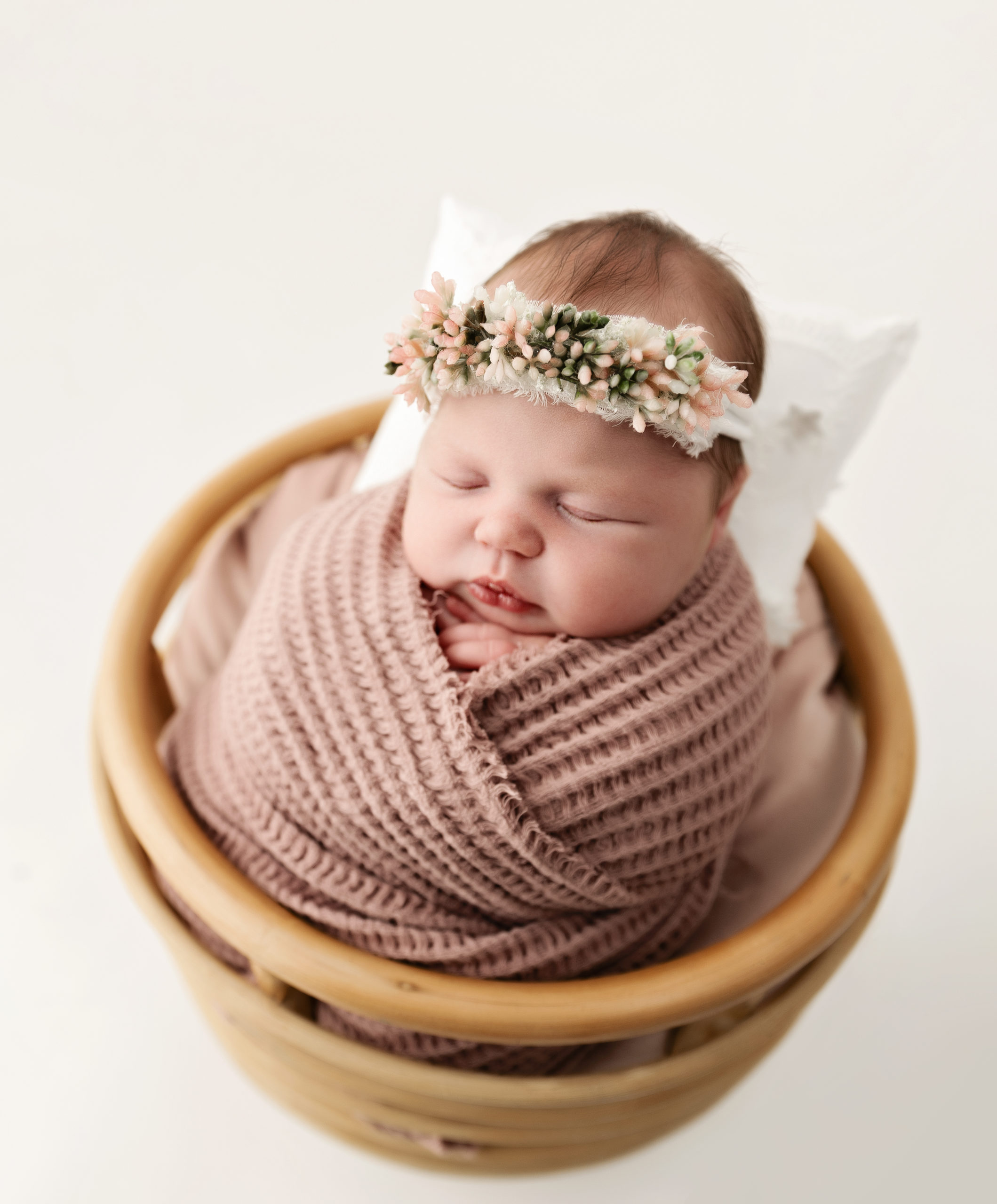 Photo of an Erie, Pa newborn in a basket